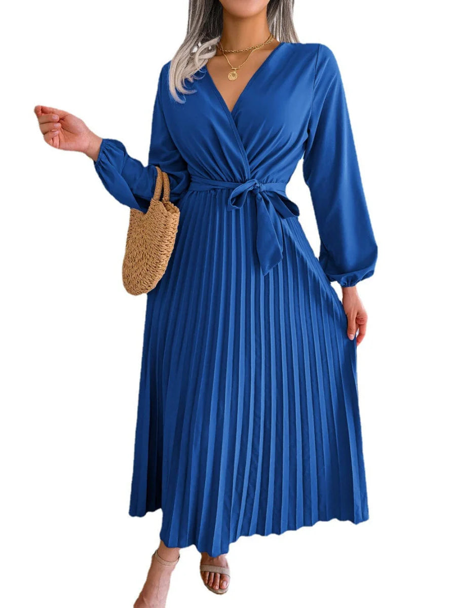 Elegant SHOWLU FASHION women's V-neck pleated maxi dress with long sleeves, A-line silhouette, and flowing swing design.