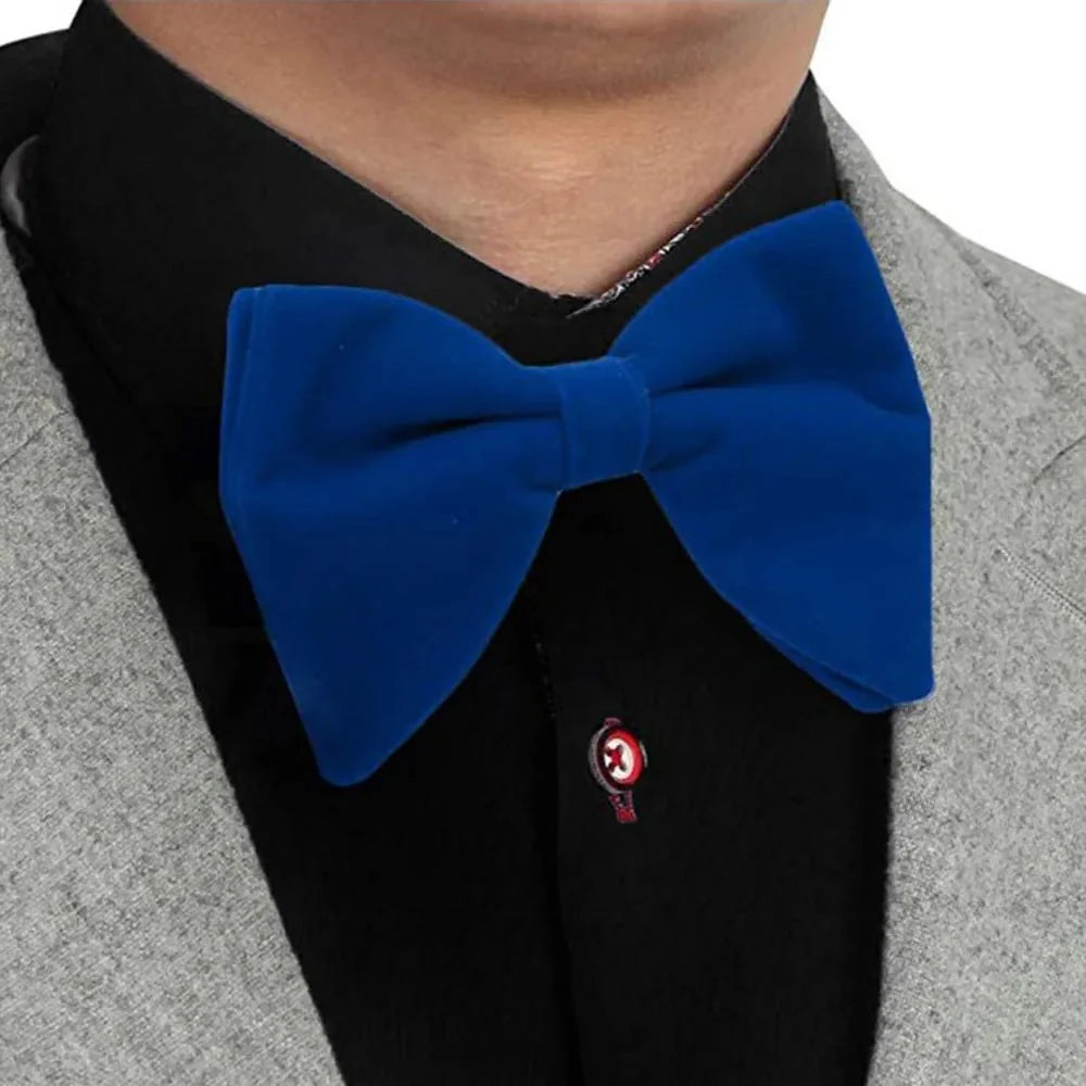 Black velvet oversized bow tie and pocket square set for tuxedos, includes red, navy, white, and green accents, mens fashion accessories
