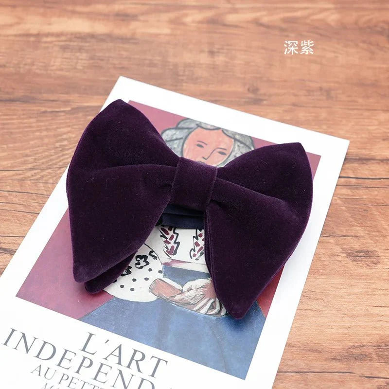 Black velvet oversized bow tie and pocket square set for tuxedos, with red, navy, white, and green handkerchiefs, stylish men's accessories