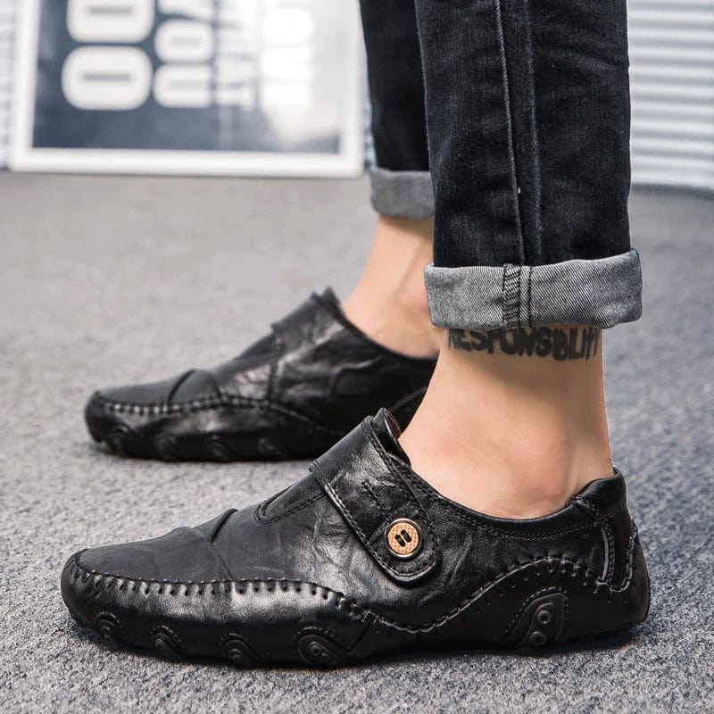 Men's genuine cow leather loafers by Swenxun, classic slip-on casual shoes with a sleek, high-quality design.