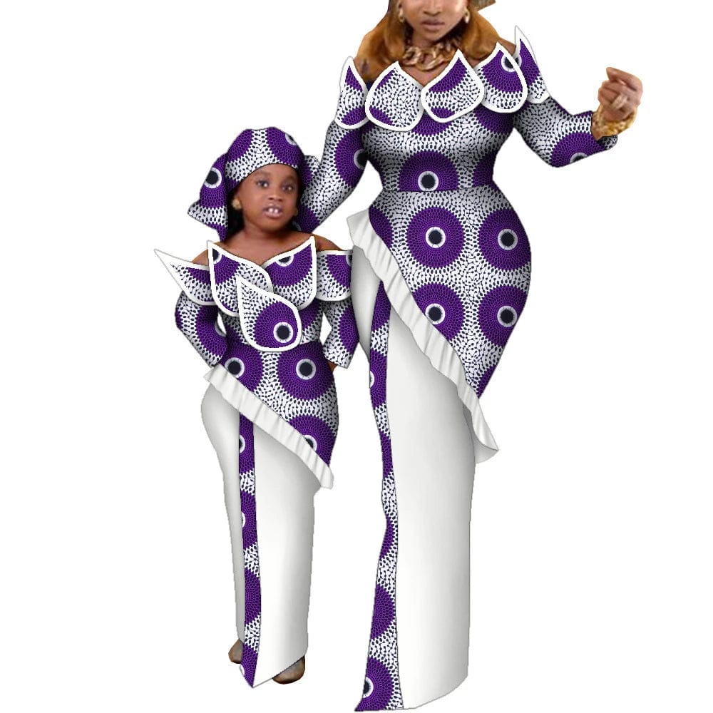 Mom and daughter matching Ankara maxi dresses in vibrant African wax print cotton, stylish and family-oriented.