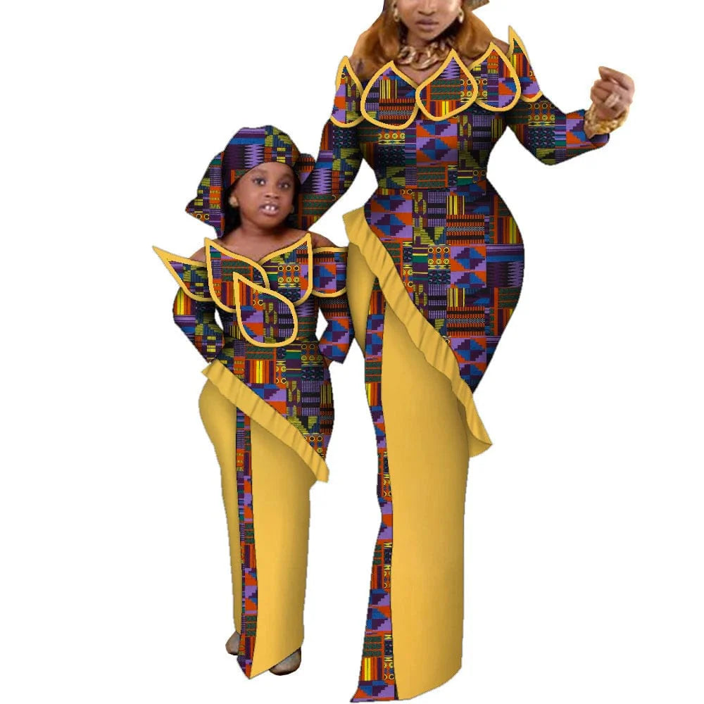 Mom and daughter wearing matching Ankara African wax print maxi dresses made of cotton by SHOWLU FASHION STORE.