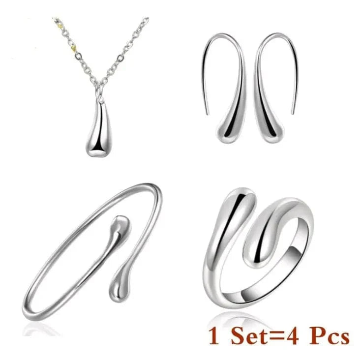 Showlu S925 silver water drop jewelry set including necklace, ring, bracelet, and earrings featuring zircon stones for women.