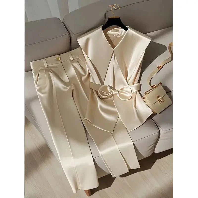 Elegant satin two-piece set by SHOWLU FASHION with Peter Pan collar vest and wide-leg pants, perfect for chic, sophisticated style.