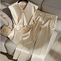 Elegant satin two-piece set by SHOWLU FASHION with a Peter Pan collar vest and wide-leg high-waist pants.