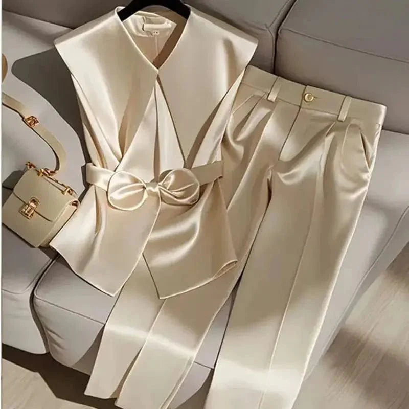 Elegant satin two-piece set by SHOWLU FASHION with a Peter Pan collar vest and wide-leg high-waist pants.