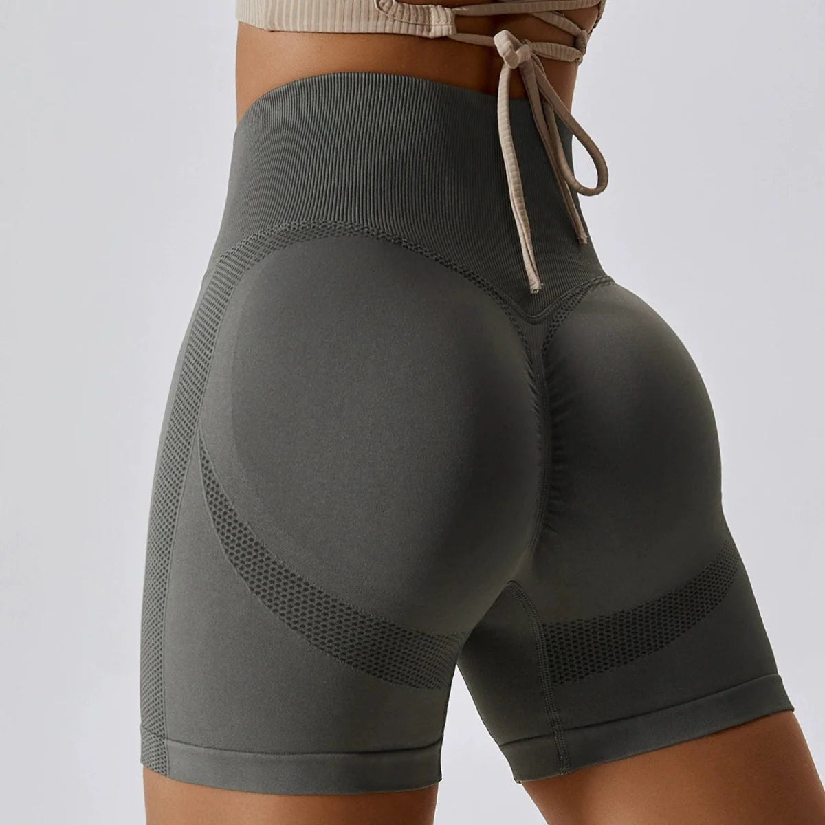 Showlu seamless high waist peach yoga shorts with hip-raise design, slimming fit, ideal for fitness, running, and sports.