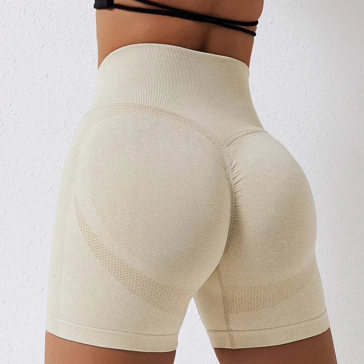 Showlu Seamless High Waist Peach Yoga Shorts with hip-raise design, perfect for fitness, running, and slimming workouts.