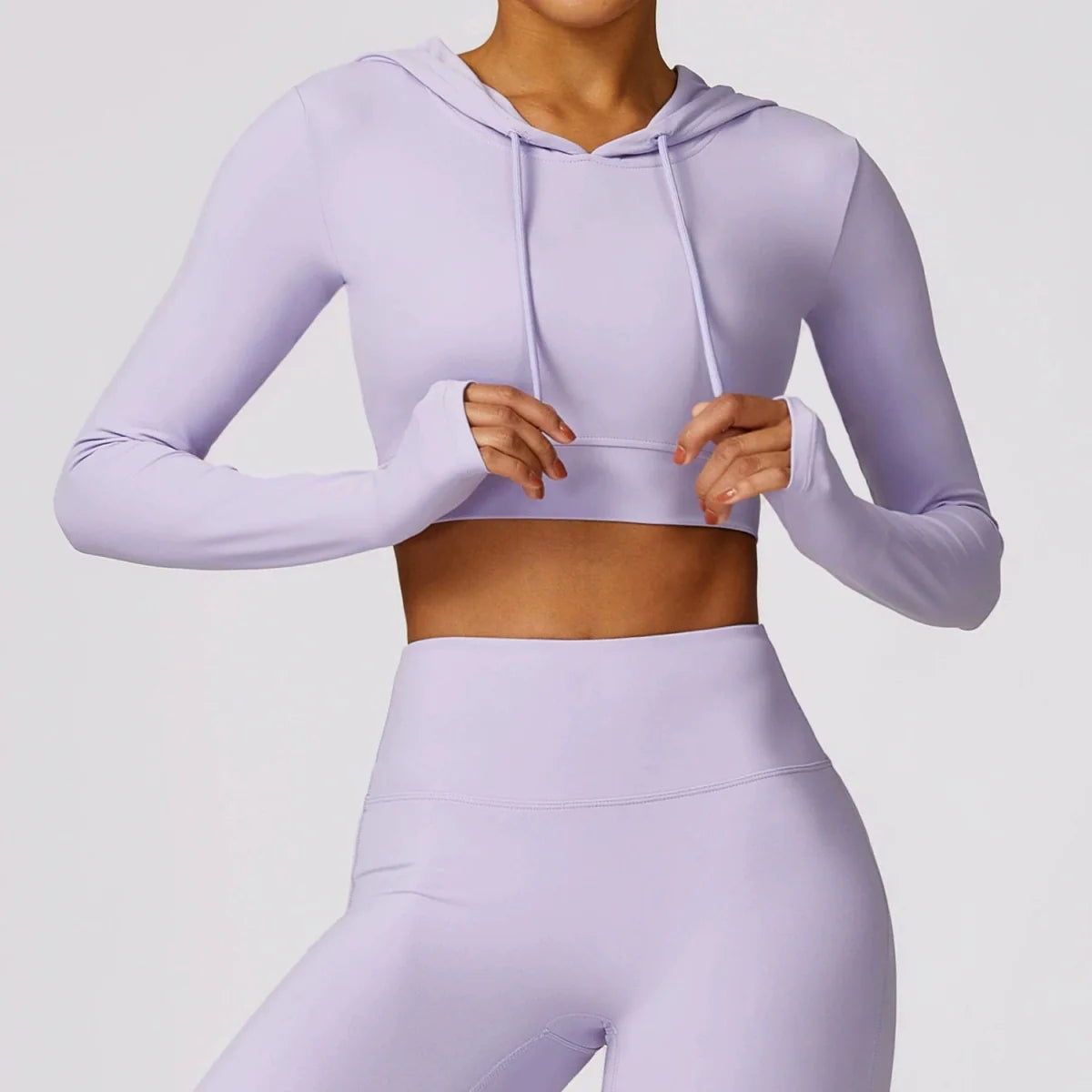 Showlu Women's quick-drying hooded long sleeve yoga T-shirt for workout, outdoor running, and exercise, with a comfortable fit.