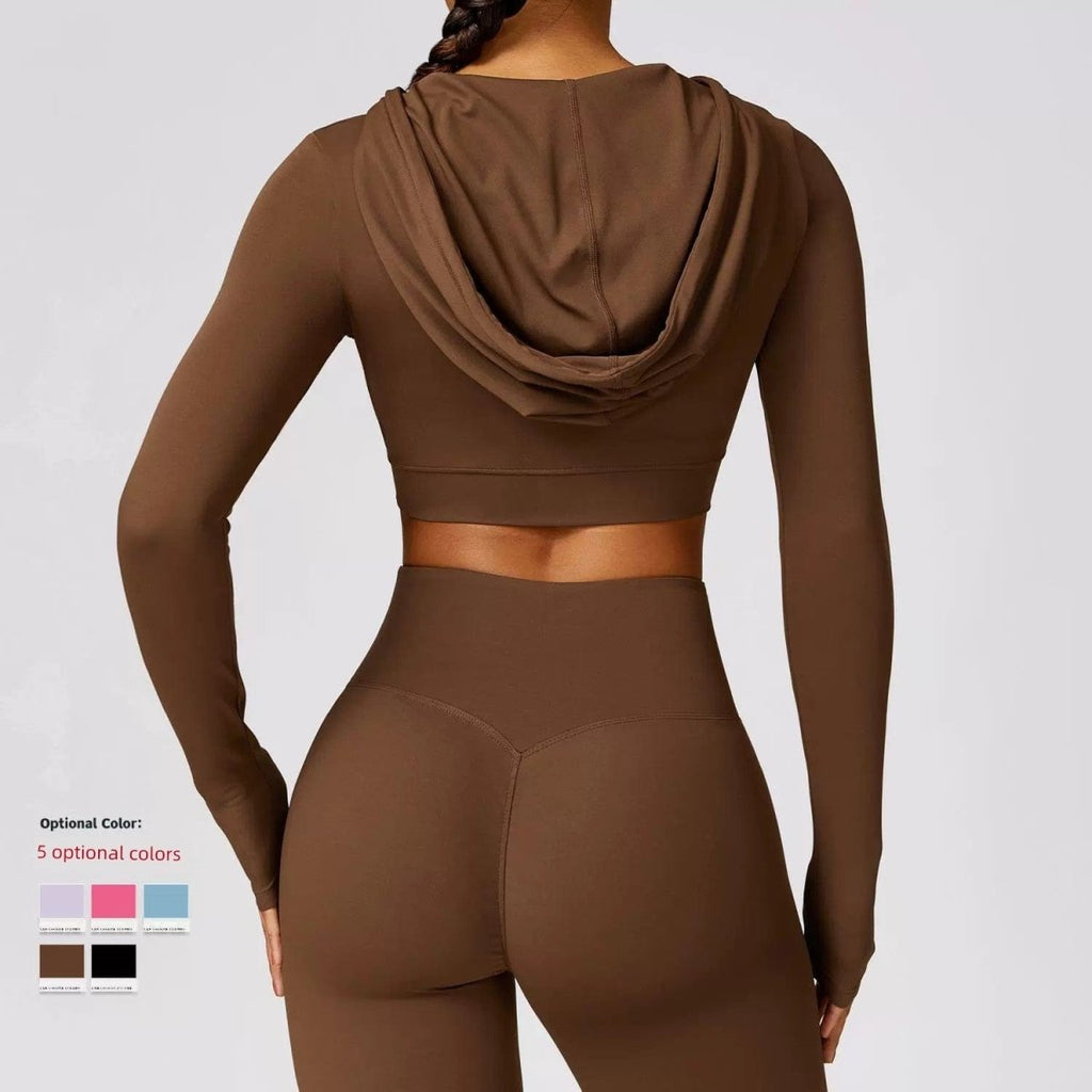 Showlu Women's quick-drying hooded long sleeve yoga T-shirt for workout and outdoor exercise, lightweight and comfortable performance top.