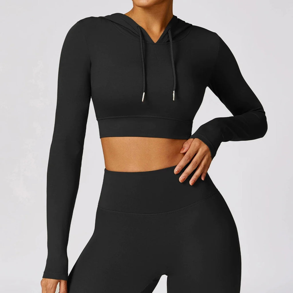 Showlu Women's quick-drying hooded long sleeve yoga T-shirt for workout and outdoor running, made of lightweight, breathable fabric