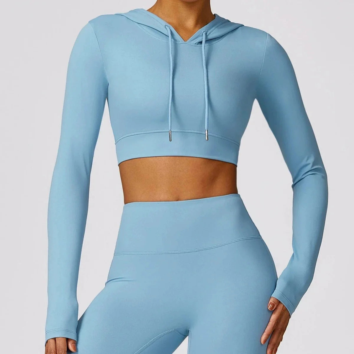 Showlu Women's quick-drying hooded long sleeve yoga t-shirt for workout, outdoor running, and exercise, without chest pad.