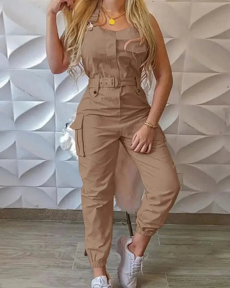 Showlu Women's loose strap jumpsuit with cargo pockets, casual solid romper, ideal for summer, featuring a relaxed fit and stylish design.