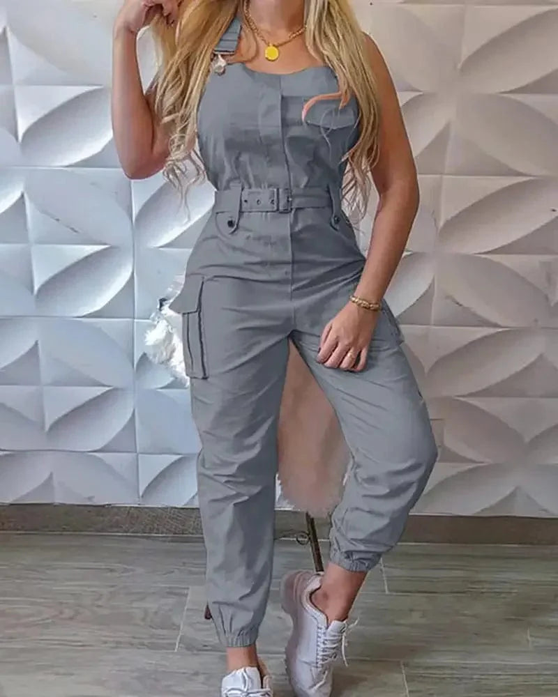 Showlu Women's loose strap jumpsuit with cargo pockets, solid color, casual and summer-ready romper for women.