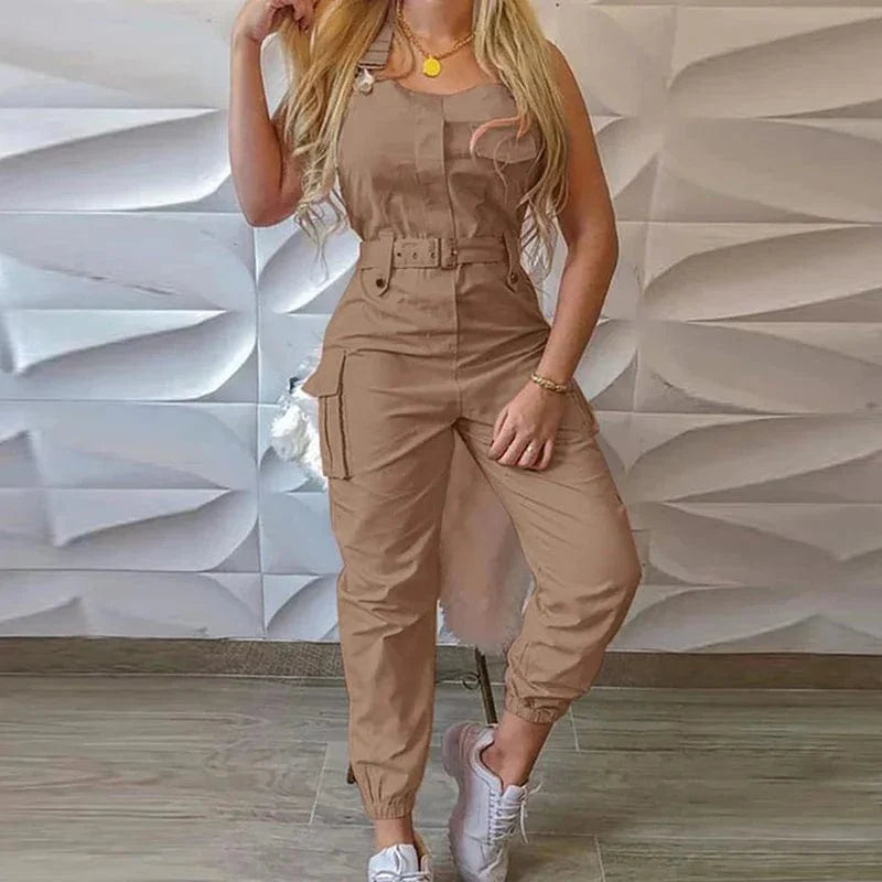 Showlu Women's loose strap jumpsuit with cargo pockets, solid color, casual summer romper with a relaxed fit and functional design.
