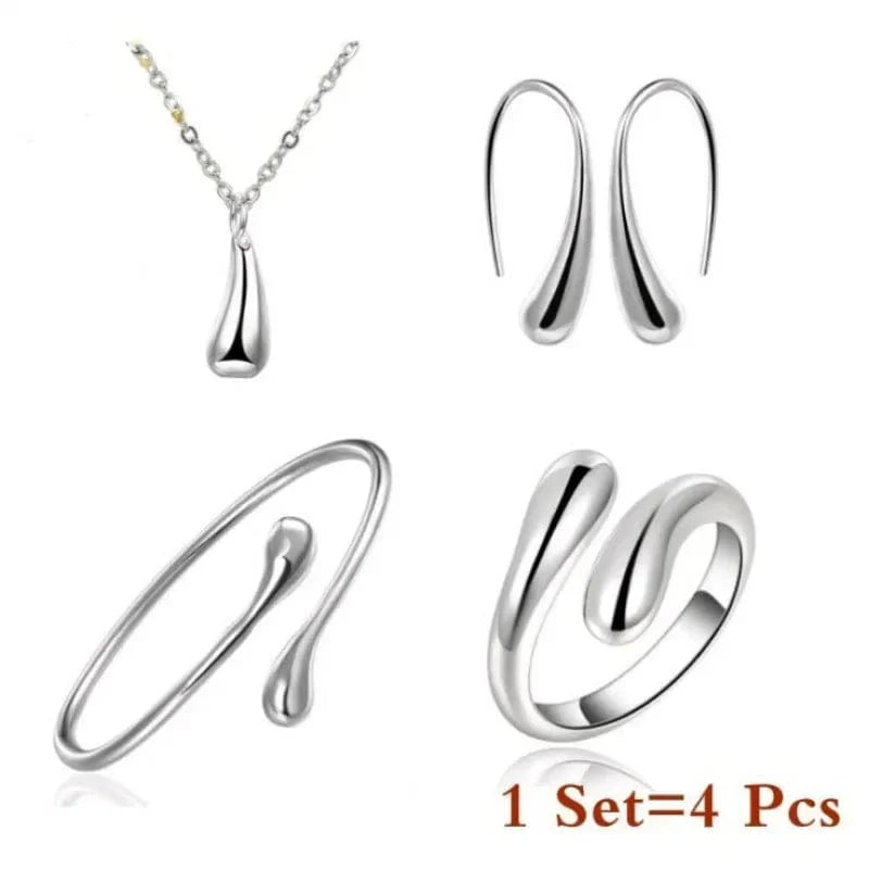 Showlu Women's Teardrop Jewelry Set with zinc alloy necklace, ring, bracelet, and earrings, featuring elegant teardrop designs.