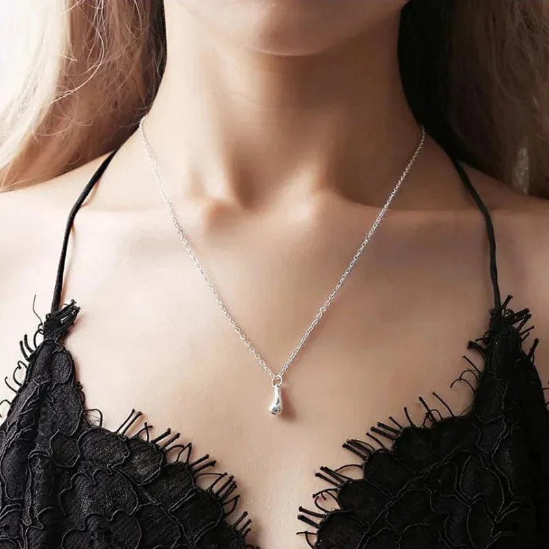Showlu Women's teardrop jewelry set featuring a zinc alloy necklace, ring, bracelet, and earrings, elegant and suitable for special occasions.