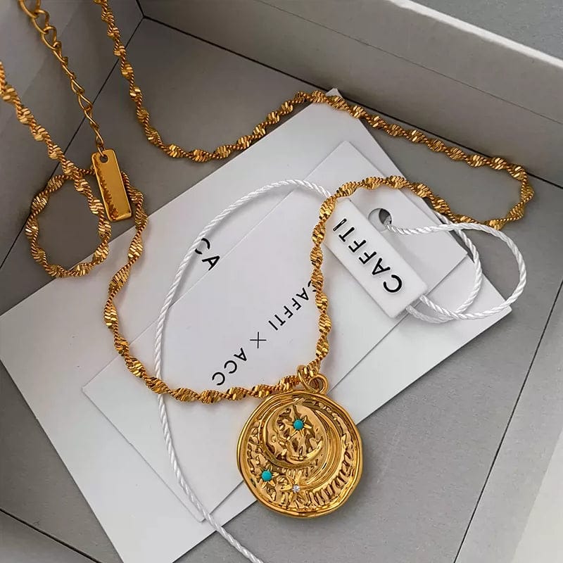Turquoise star and moon necklace with vintage gold coin brass pendant, showcasing a delicate, stylish jewelry piece for women.