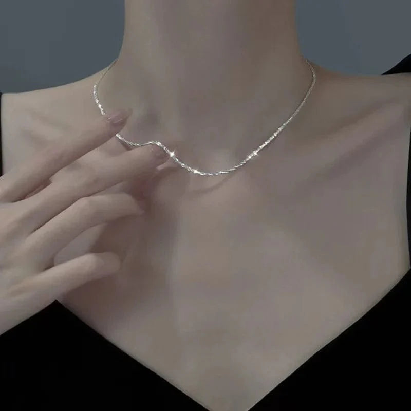 Elegant double-layer pearl love pendant necklace for women, featuring copper jewelry with a unique, exquisite design.