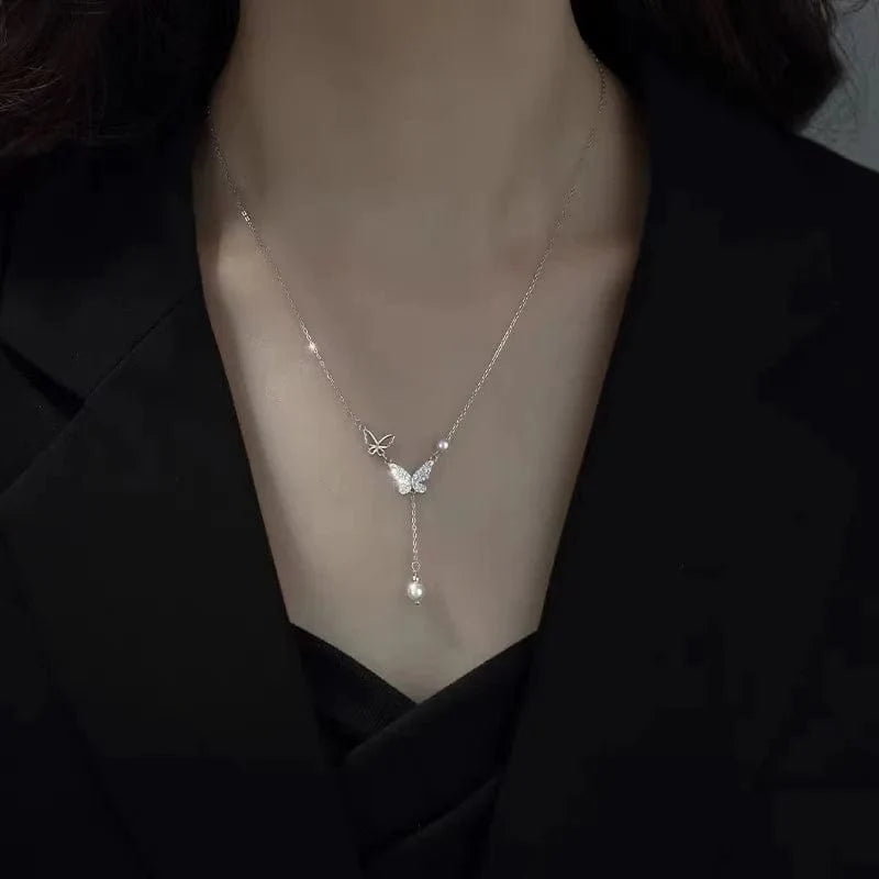 Elegant double-layer pearl love pendant necklace by Showlu Fashion, featuring copper jewelry design for women’s wedding or party wear.