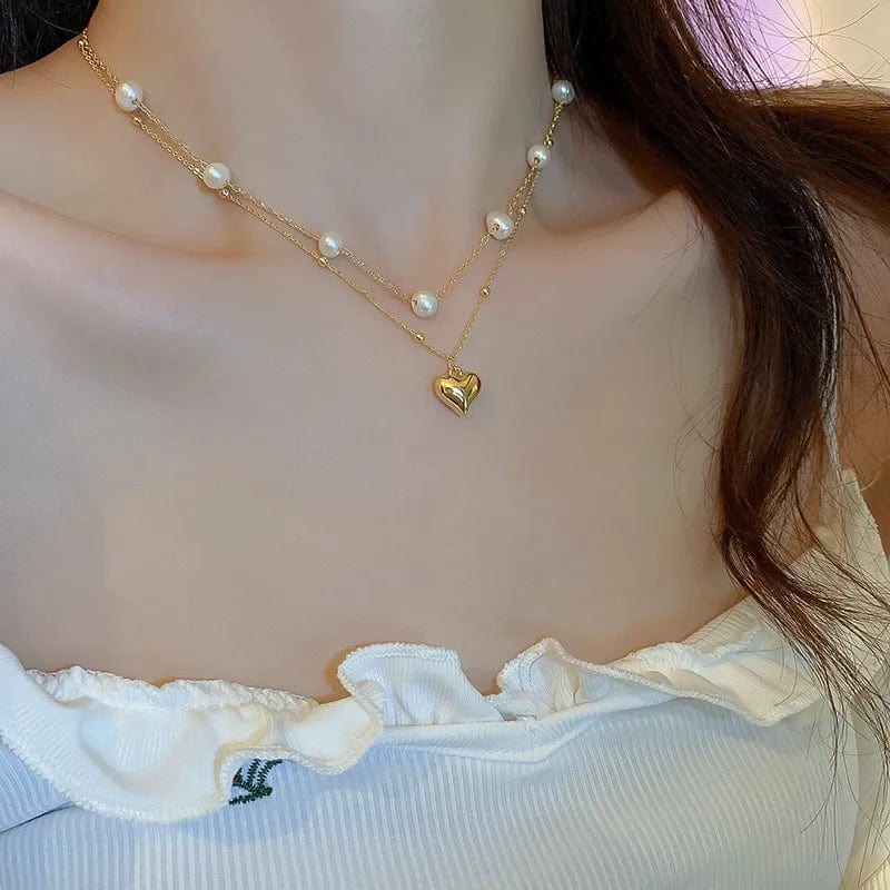 Elegant double-layer pearl love pendant necklace by Showlu Fashion, featuring copper jewelry for women, perfect for weddings and parties.