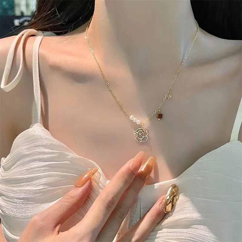Elegant double-layer pearl love pendant necklace for women, featuring copper jewelry design, suitable for weddings and parties.
