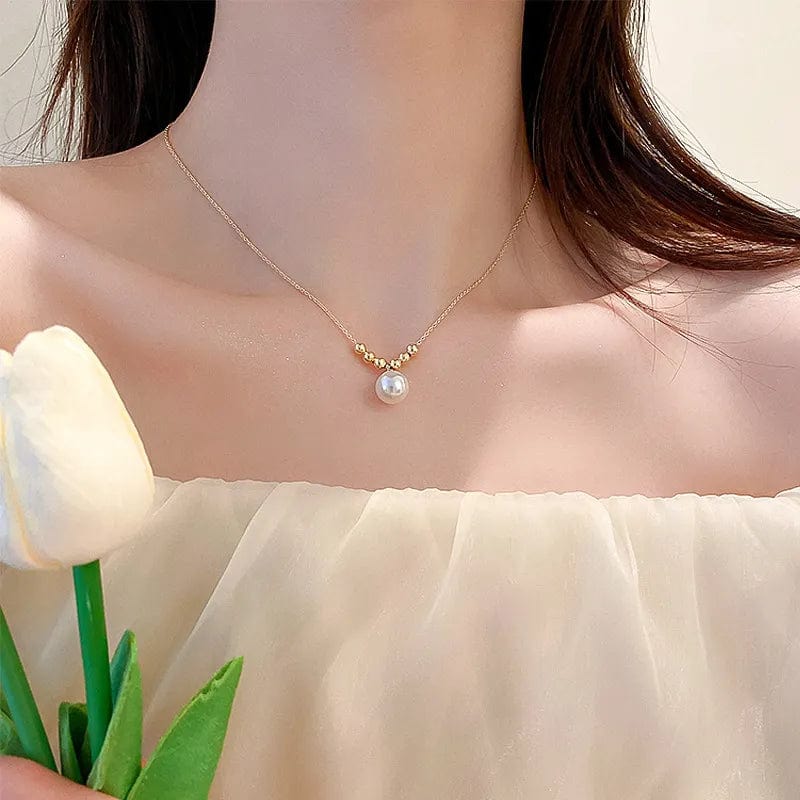 Elegant double-layer pearl love pendant necklace for women, featuring copper jewelry design, perfect for weddings and parties.
