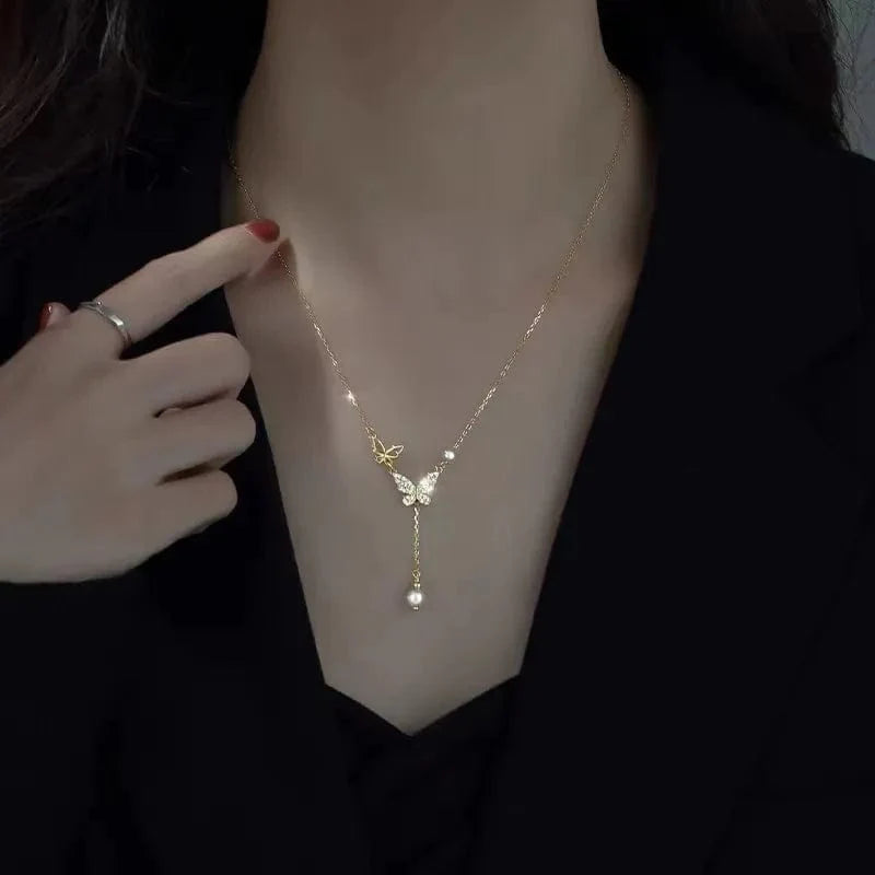 Elegant double-layer pearl love pendant necklace by Showlu Fashion for women, perfect for weddings and special occasions.
