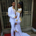Slim fit men's tuxedo suit with gold lapel, formal blazer and matching pants, designed for weddings and special occasions.