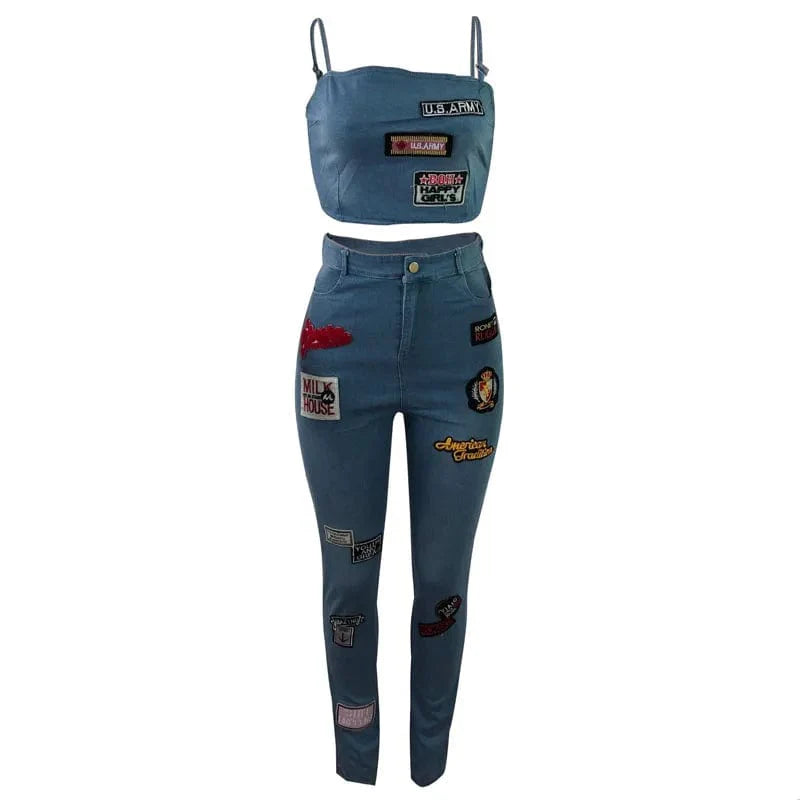 Women's cartoon sticker skinny jeans and camisole set by Showlu Fashion, featuring off-shoulder strap tops and high-waist casual style.