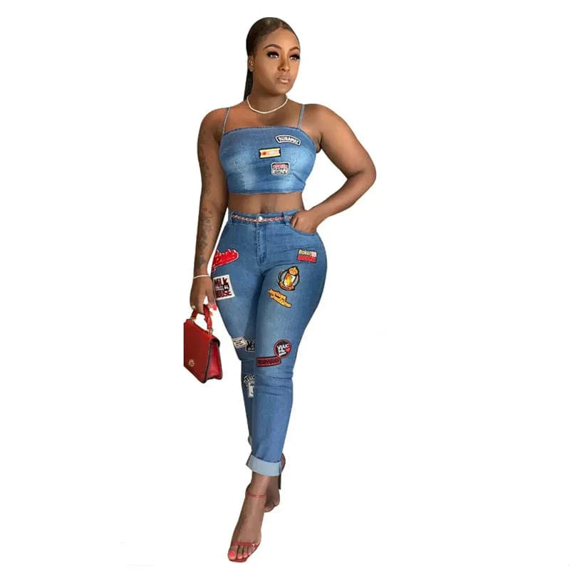 Women's cartoon sticker skinny jeans and camisole set featuring off-shoulder straps, high waist, casual and trendy style.