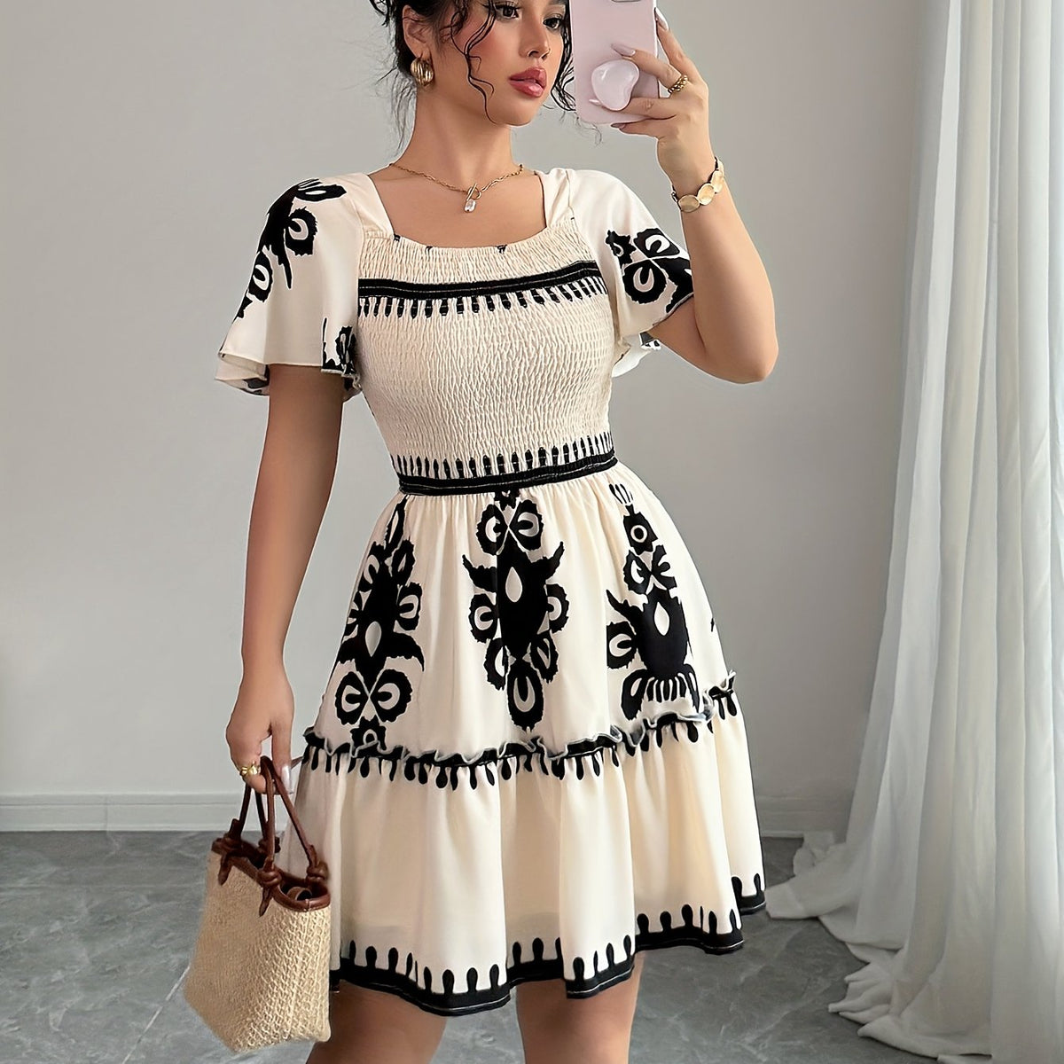 Elegant Mini Dress with a Square Neckline, Featuring Fashionable Prints, Pleats, a Cinched Waist for a Slimming Effect, And Ruffled Edges with an A-Line Hem.