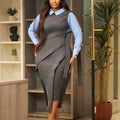 Solid color SHOWLU FASHION waist pleat tie-strap straight shirt dress hanging on a hanger, showcasing its simple, elegant design.