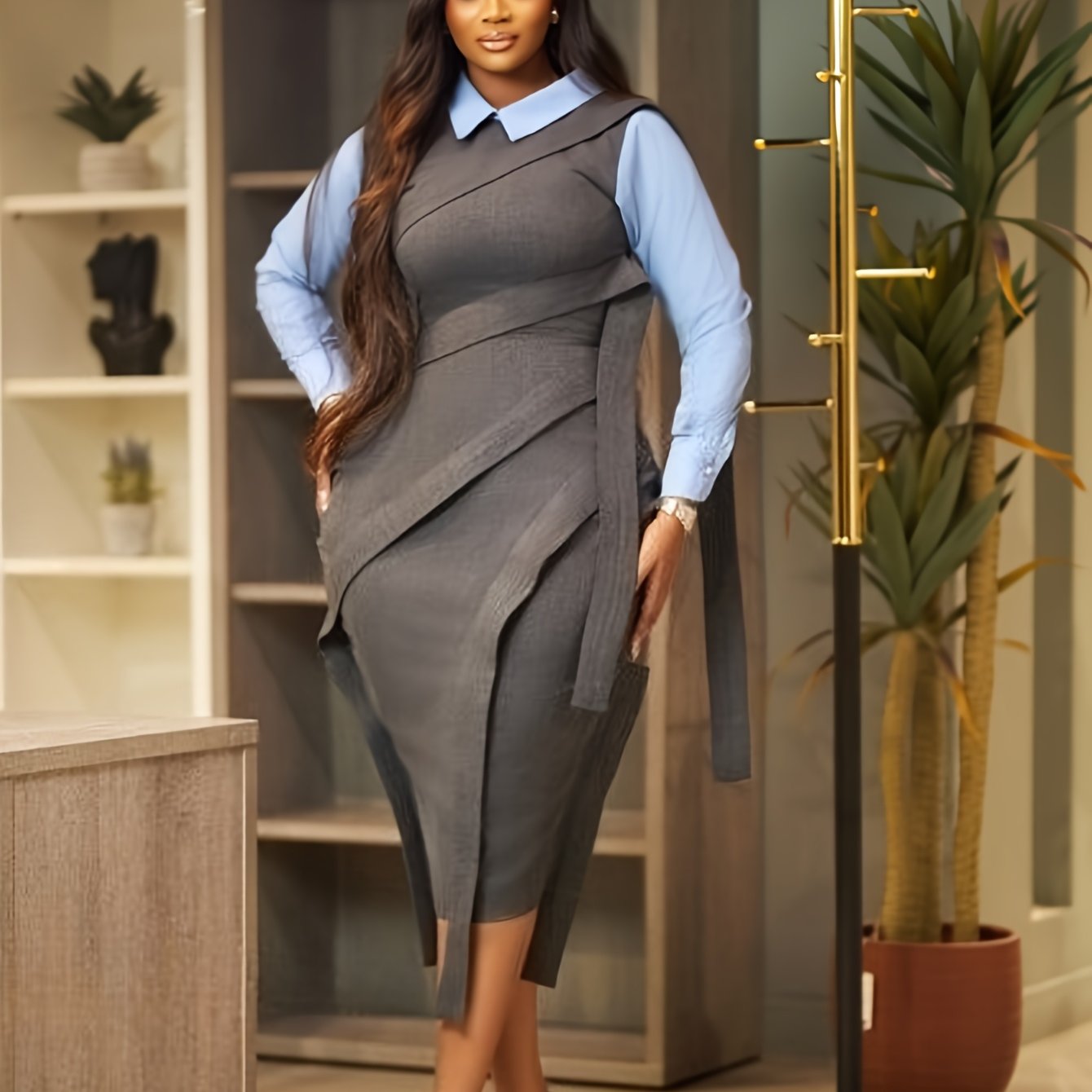 Solid color SHOWLU FASHION waist pleat tie-strap straight shirt dress hanging on a hanger, showcasing its simple, elegant design.