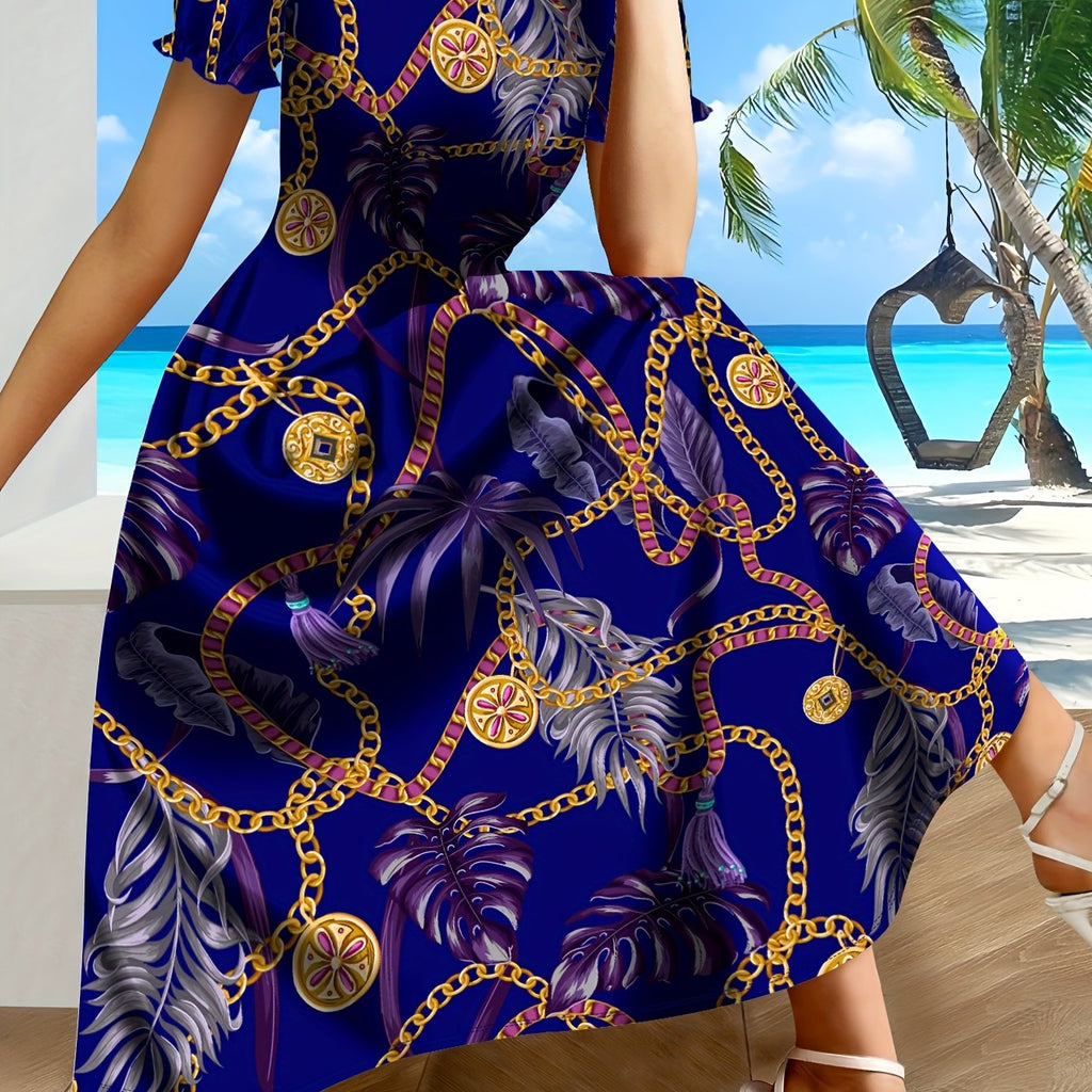 SHOWLU Women's Tropical Chain Print A-Line Dress in blue and gold fabric, featuring a vibrant tropical pattern and elegant silhouette.