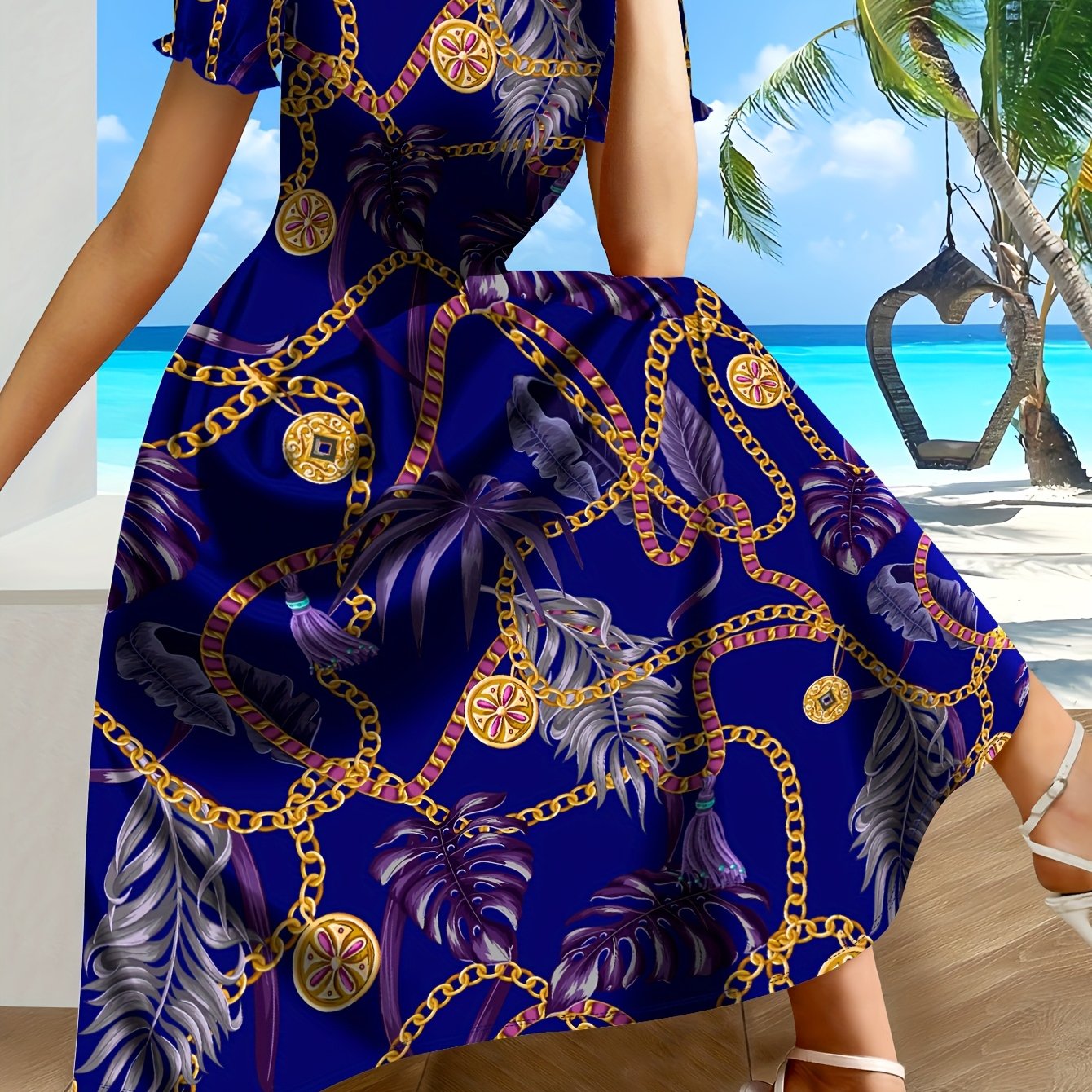 SHOWLU Women's Tropical Chain Print A-Line Dress in blue and gold fabric, featuring a vibrant tropical pattern and elegant silhouette.