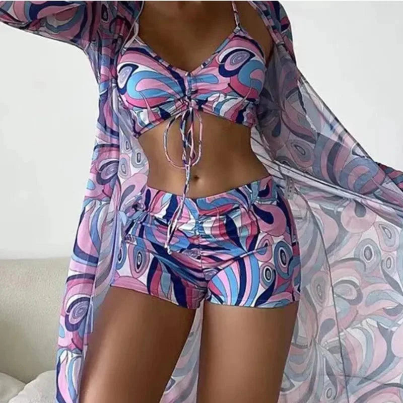 Female wearing Showlu Fashion women's racerback tankini set with UV protection, featuring a stylish swimsuit design.