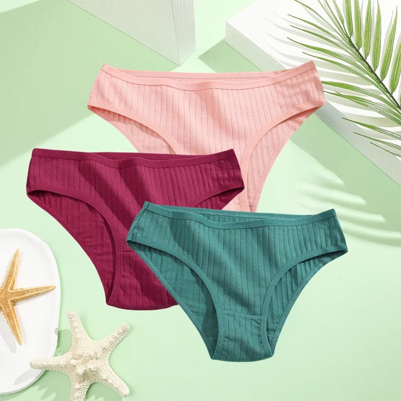 Three pairs of FINETOO women's cotton briefs in low-rise solid style, available in XS to 7XL, displayed in a set of underwear.