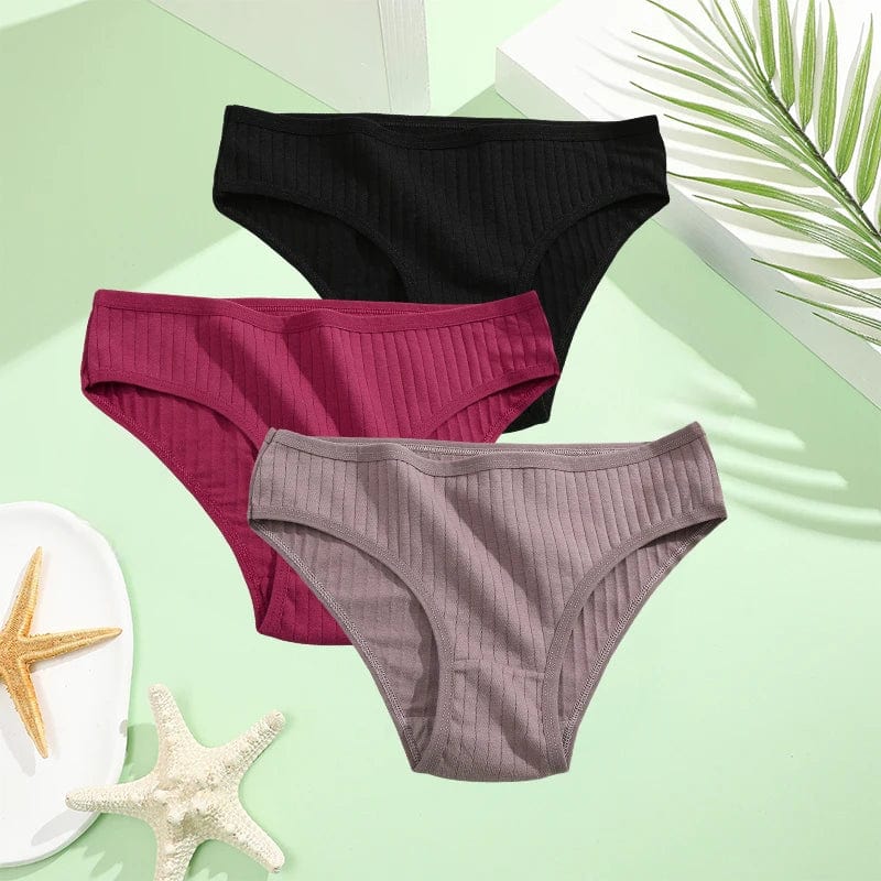 Three pairs of FINETOO women's cotton briefs in low-rise solid styles, available in XS to 7XL, shown in assorted colors.