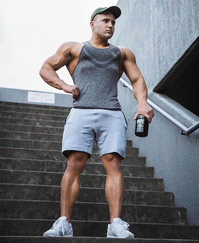 Showlu men's running vest made of breathable polyester, designed for fitness training and bodybuilding.