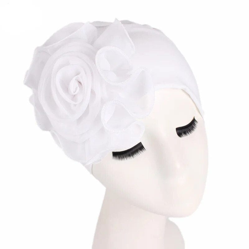 Flower print Muslim turban hat for women, chemo cancer beanie cap with vibrant floral design and comfortable headwear for hair loss.