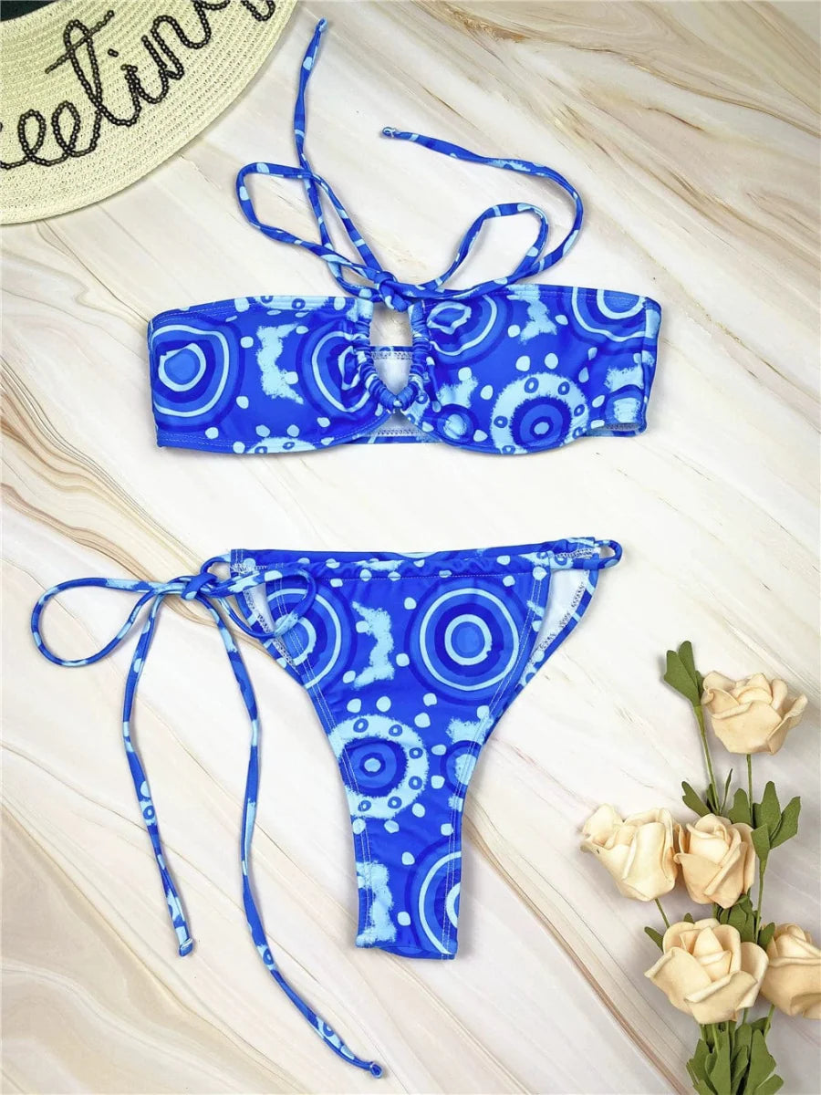 Showlu Fashion print bikini set with adjustable straps, featuring a vibrant beach-inspired design and separate top and bottom.
