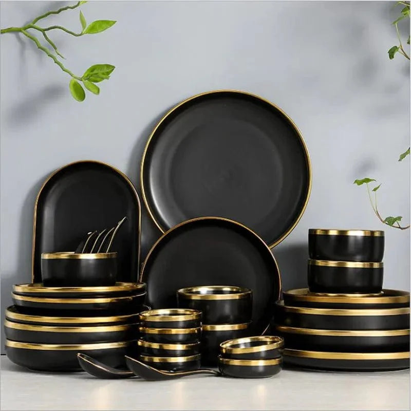Showlu black porcelain dinner plates with gilt rim, part of ceramic tableware set for serving food like rice, salad, or noodles.