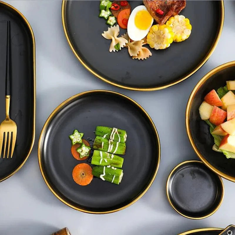 Showlu Black Porcelain Dinner Plates with gilt rim, part of ceramic tableware set for serving food like rice, salads, and noodles.