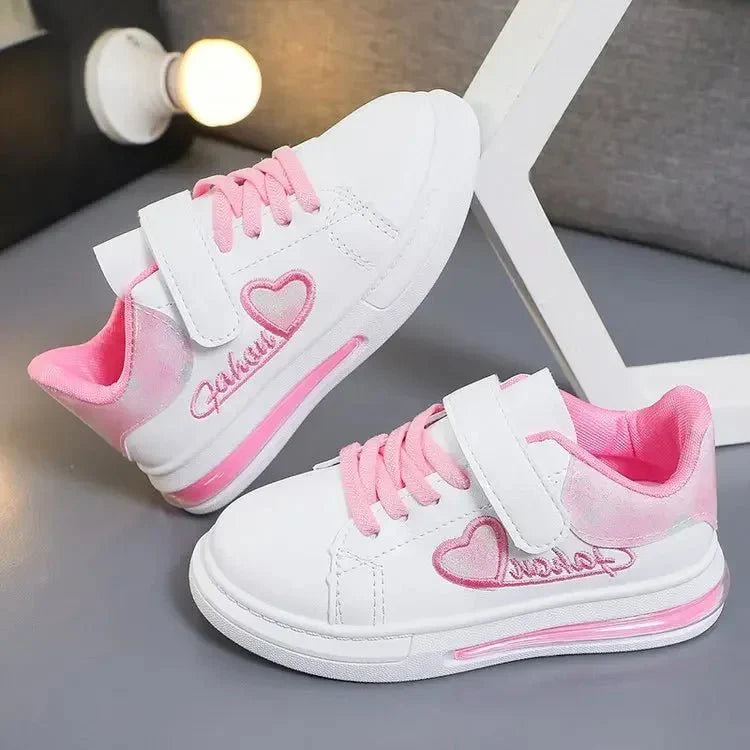 White MINISO girls' skate shoes with heart embroidery, casual kids' sneakers suitable for school and sports.