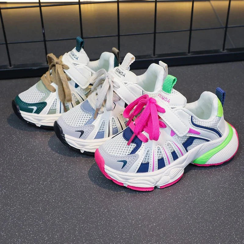 Girls' color block mesh sneakers by SHOWLU, breathable, non-slip chunky shoes with lace-up design, ideal for outdoor activities.
