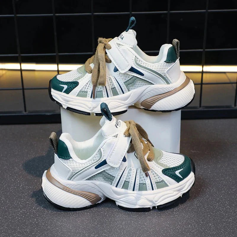 Showlu Girls color block mesh sneakers with breathable, non-slip chunky soles and lace-up design for outdoor activities.