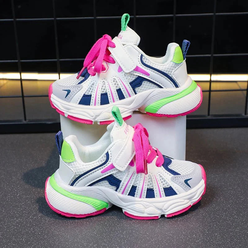 Showlu Girls color block mesh sneakers with breathable design, non-slip chunky soles, lace-up style, ideal for outdoor activities.