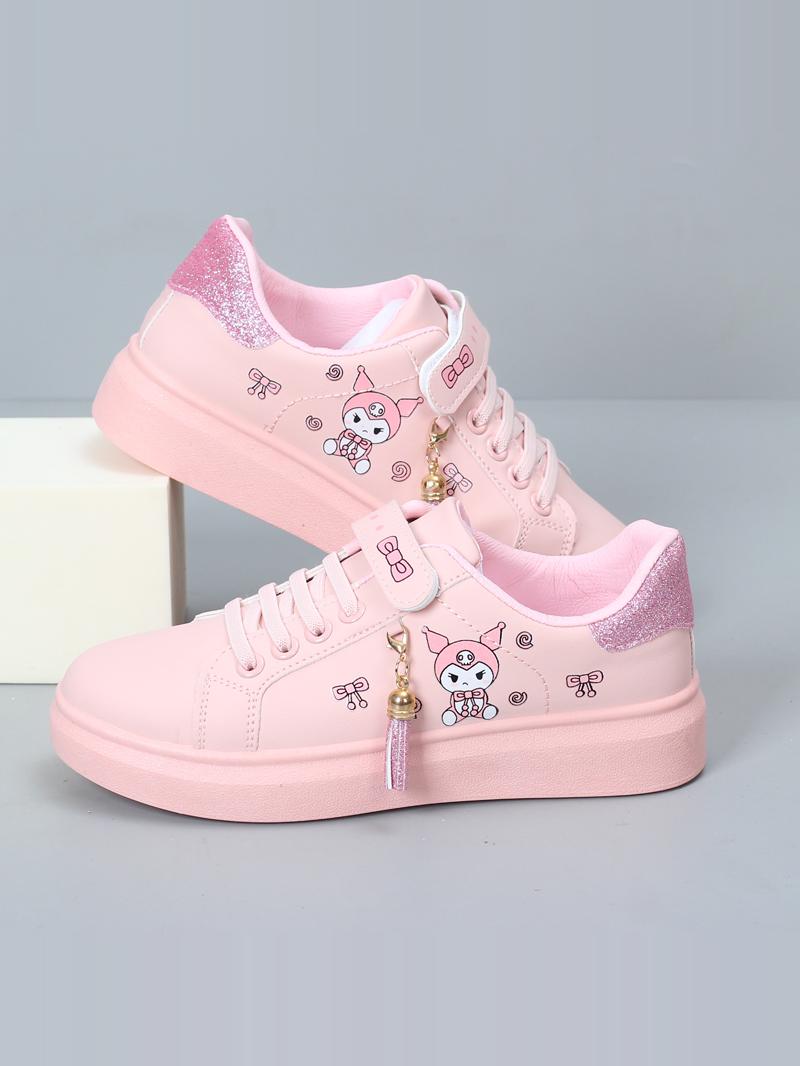 Girls white PU leather low ankle sports board shoes, stylish kids sneakers with flat soles and magic stick closures.