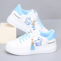 Showlu girls' white PU leather low ankle sports board shoes with flat soles, perfect for kids' casual and active wear.